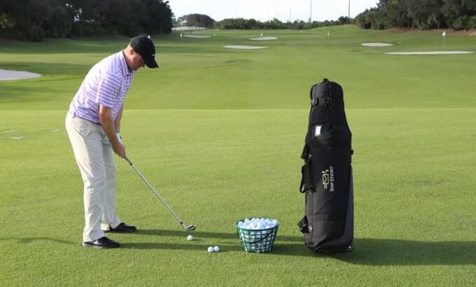 Golfer Hitting Balls