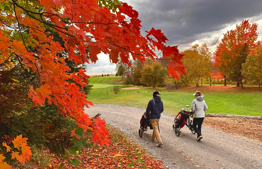 Golfers wearing fall golf outfits